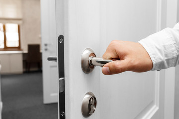 Naklejka premium Man open the door