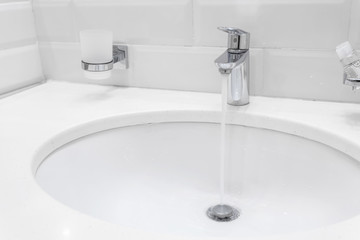 chrome faucet in modern bathroom