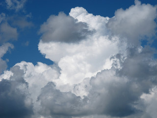 Stormy clouds in the blue summer sky