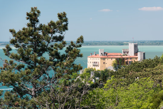 The castle of Duino and the beauty of the cliffs on the rocky coast