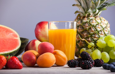 Various fruits on the white wooden table
