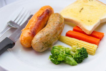 Sausages and vegetables for breakfast