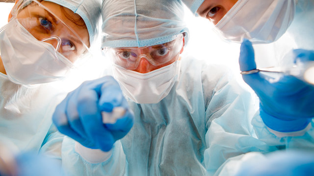 Team of surgeon in uniform