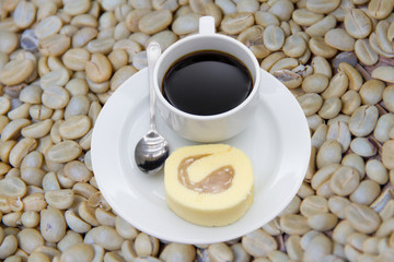 arabica coffee beans on shell beans background