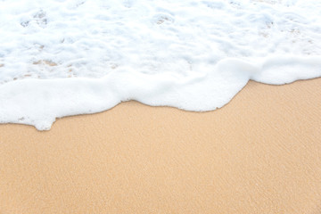 wave of ocean on sandy beach. Background.