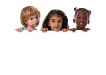 Group of multiracial kids portrait with white board.Isolated