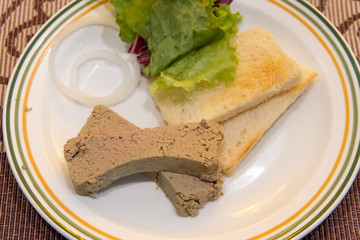 Goose liver and vegetables
