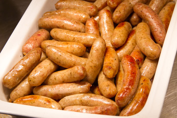Sausage put in tray for breakfast