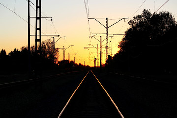 Fototapeta na wymiar View of the railway against the sky just after sunset city Gatchina Russia