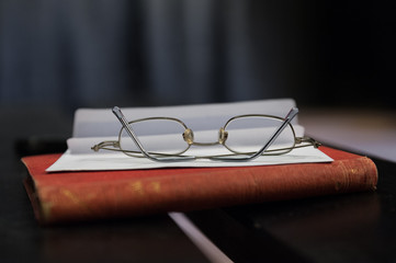 Glasses on book