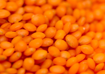 Red lentils as background. macro