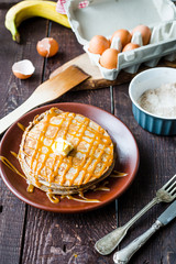 Healthy Banana Pancakes with Bananas and Salted Caramel Sauce, Vertical View