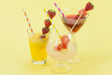 refreshing drinks on colored background