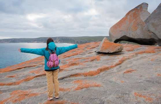 Hiker Girl in Remarkable Rocks on Kangaroo Island, South Australia
