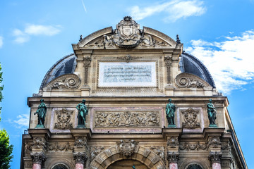 Fragment of a baroque fountain Saint-Michel (architect Gabriel Davioud, 1858 - 1860). Fountain Saint-Michel - popular architectural historical landmark. Latin Quarter, Paris, France.