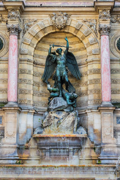 Fragment of a baroque fountain Saint-Michel (architect Gabriel Davioud, 1858 - 1860). Fountain Saint-Michel - popular architectural historical landmark. Latin Quarter, Paris, France.