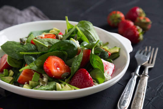Salad with spinach fresh strawberries and cheese