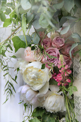 Beautiful wedding bouquet with peony and roses