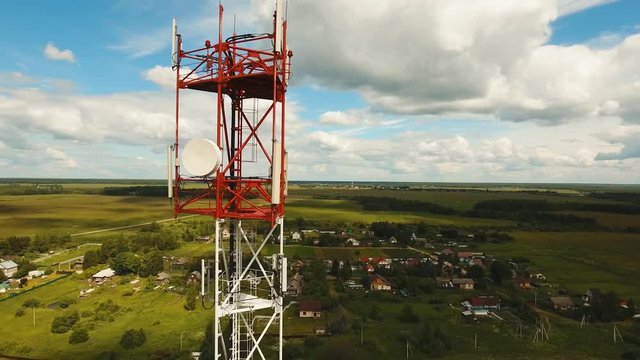 Aerial view Cell phone tower. Tower of communications with lot of different antennas. Telecommunication tower. Aerial footage, 4K video