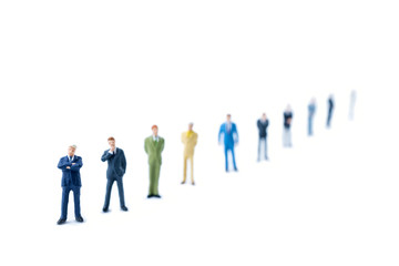 Miniature people teamwork. Business concept.