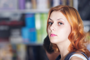 Portrait of a girl in a shop