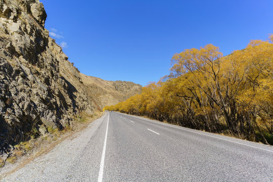 Beautiful Lindis Pass Scenic Reserve is the highest point on the South Island's state highway network of New Zealand in Autumn
