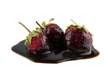 Strawberry in chocolate isolated on white background