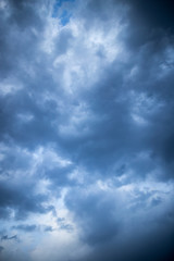 Beautiful clouds at sunset after rain as background .