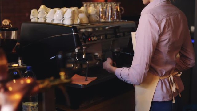 Close up of barista which making a cafe