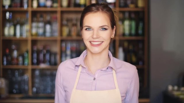 Beautiful female barista at work 