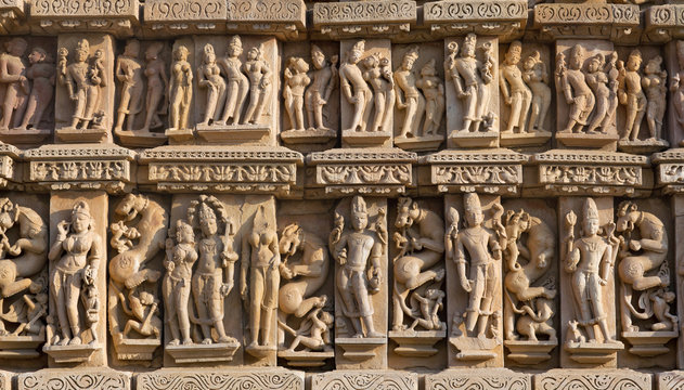 Ancient bas-relief at famous Kandariya Mahadeva temple in Khajuraho, India
