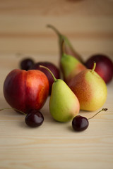 Fresh fruits on the wooden table.