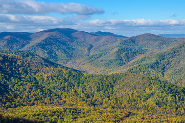 Old Rag Mountain view in Shenandoah, Virginia with yellow and golden orange foliage on forests