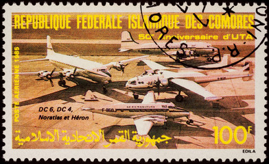 Four passenger aircrafts on postage stamp
