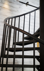 Dark iron metal spiral staircase
