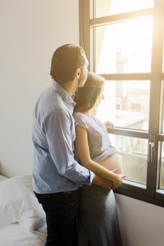 Couple at home, pregnancy