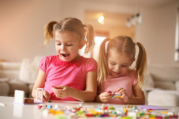 Fototapeta premium Girls playing at home.