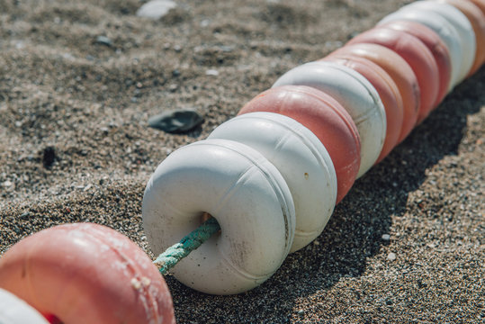 Lane Dividers Laying On The Beach