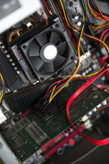 CPU cooler on the computer's motherboard. Close up view.