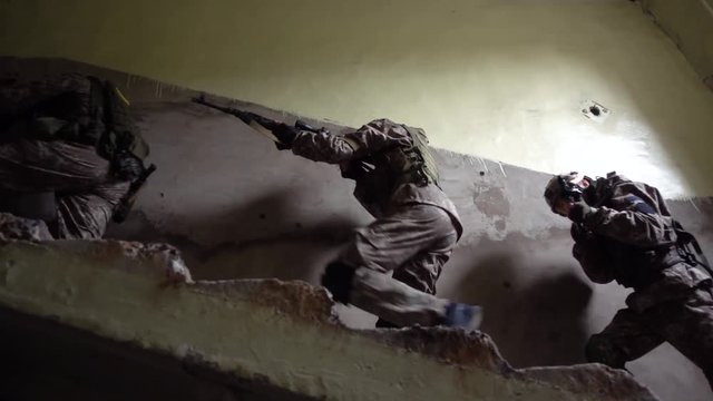 Team breaking into a building