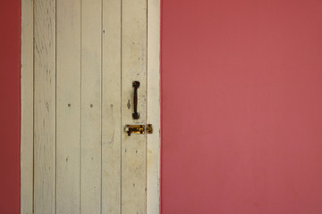 white window on pink wall