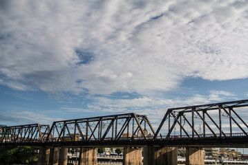 Beautiful clouds in the sky at Mae Klong river and railway bridge Ratchaburi province Thailand