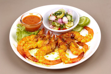 Charcoal boiled ,Prawn satay served with side disk.