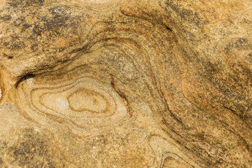 The surface of the sandstone corroded naturally.