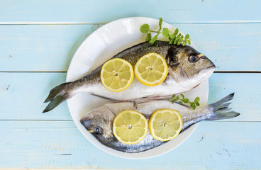 Fresh raw fish with lemon 