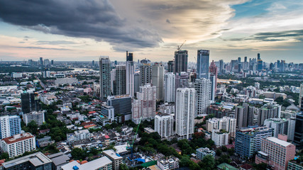Fototapeta premium Aerial drone view of Bangkok during beautiful cloudy sunset