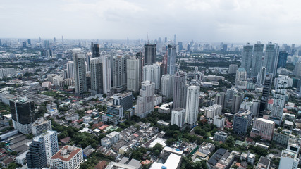 Fototapeta premium Aerial drone view of Bangkok during cloudy day