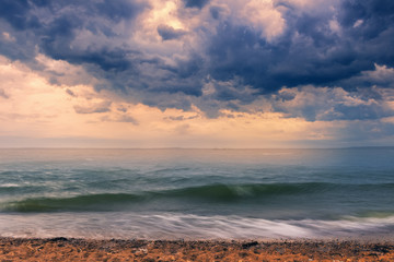 Landscape with windy weather with thunder clouds at lake