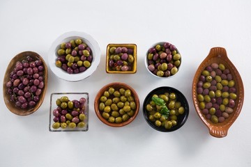 Pickled olives on white background