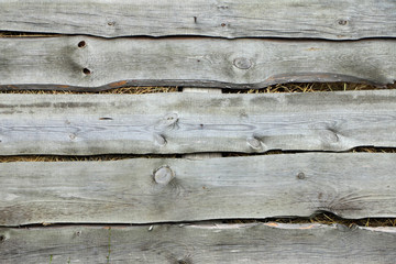 Obraz premium wooden fence hay background